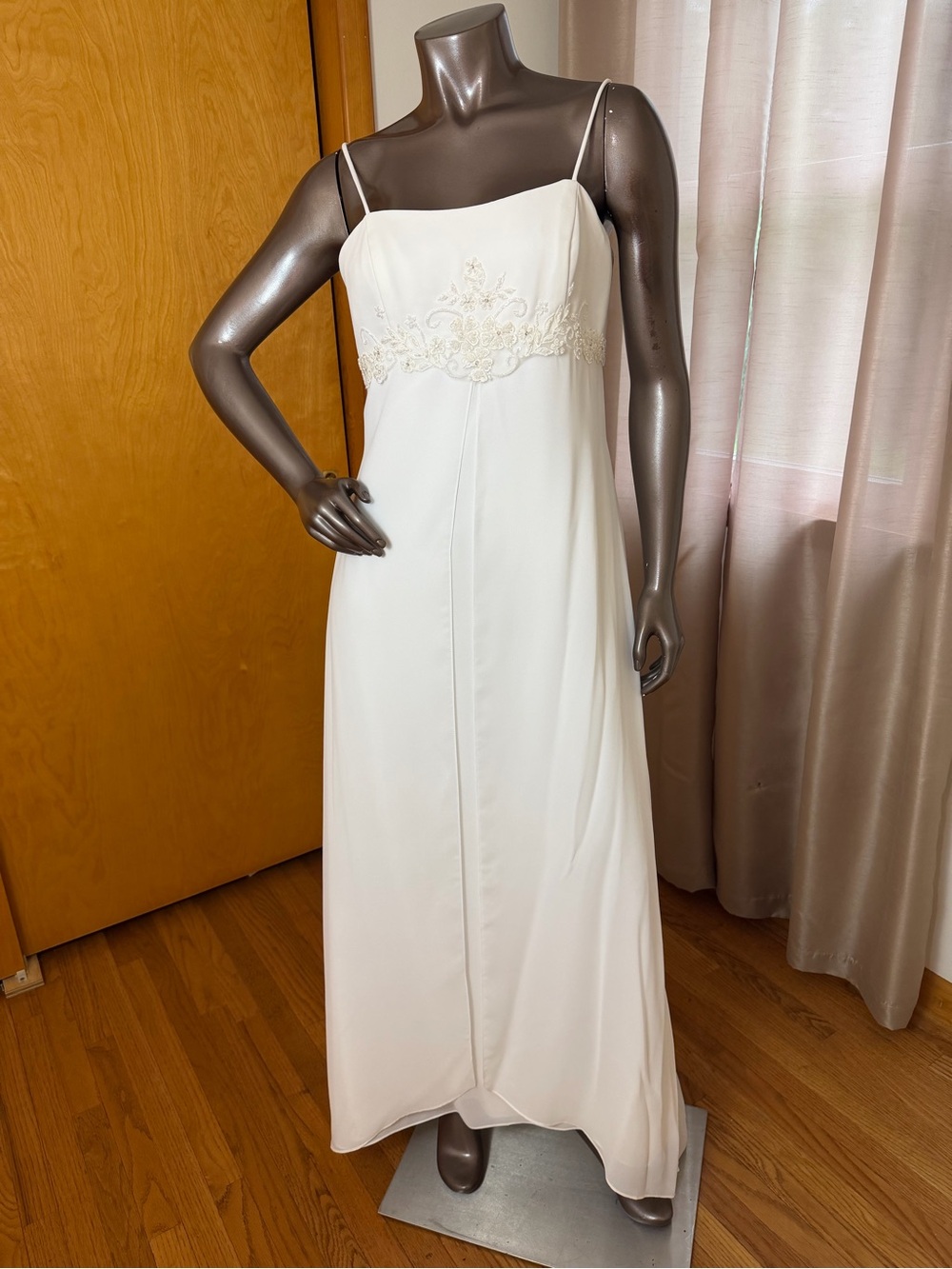 David’s Bridal styleT8077 ivory chiffon wedding dress with empire waistline.